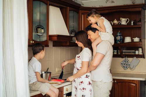 family cooking in home